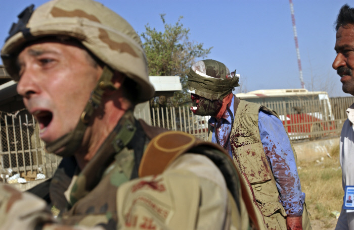 "Pourquoi Monsieur, pourquoi?" Etats Unis d'Amérique contre Iraq, une année d'occupation.